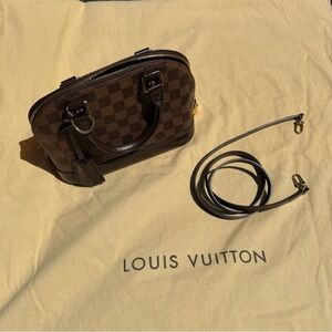 Louis Vuitton Damier Ebene Mini Alma in Dark Brown